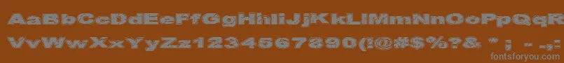 Cfcrackedstone-fontti – harmaat kirjasimet ruskealla taustalla