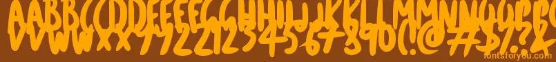 CartoonMarker Font – Orange Fonts on Brown Background
