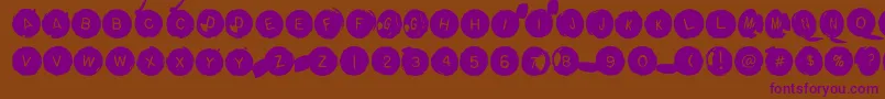 Backspacerround-Schriftart – Violette Schriften auf braunem Hintergrund