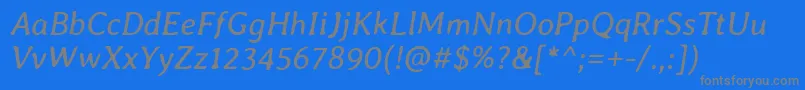 AverialibreItalic-fontti – harmaat kirjasimet sinisellä taustalla