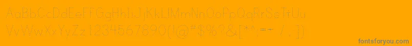 PrintDashed Font – Gray Fonts on Orange Background