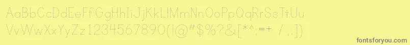 PrintDashed Font – Gray Fonts on Yellow Background