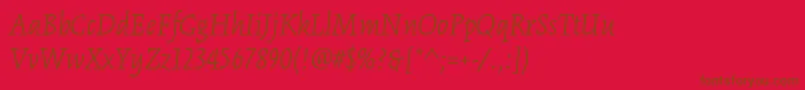 KinesisstdLightitalic Font – Brown Fonts on Red Background