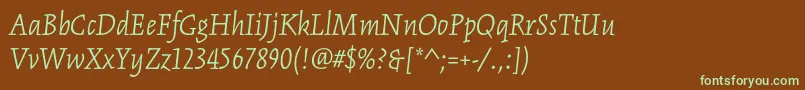 フォントKinesisstdLightitalic – 緑色の文字が茶色の背景にあります。