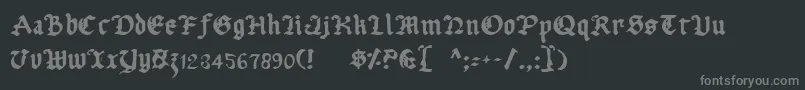 フォントUberhГ¶lme – 黒い背景に灰色の文字