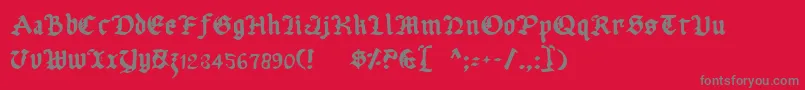 フォントUberhГ¶lme – 赤い背景に灰色の文字