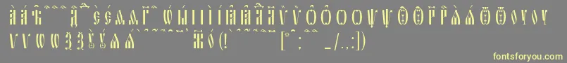 SlavjanicKucsSpacedout Font – Yellow Fonts on Gray Background