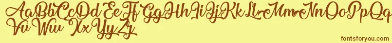 MechanicOfTheHeart Font – Brown Fonts on Yellow Background