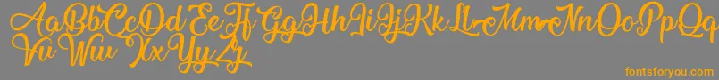 MechanicOfTheHeart Font – Orange Fonts on Gray Background