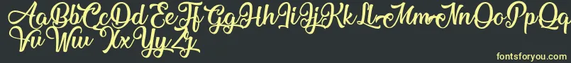 MechanicOfTheHeart Font – Yellow Fonts on Black Background