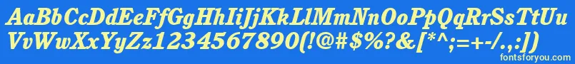 Czcionka ItcCushingLtHeavyItalic – żółte czcionki na niebieskim tle