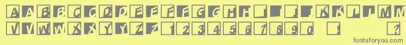 Abclogosxyzcrazy-fontti – harmaat kirjasimet keltaisella taustalla