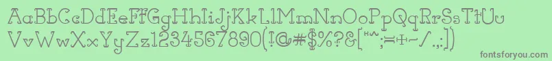 フォントHornsOfDilemma – 緑の背景に灰色の文字