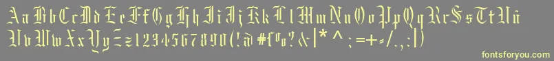 Moksrg Font – Yellow Fonts on Gray Background