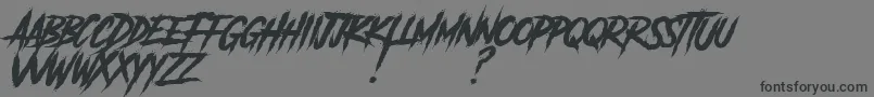Czcionka AnotherDangerSlantedDemo – czarne czcionki na szarym tle
