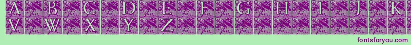 Czcionka Pompadourinitials – fioletowe czcionki na zielonym tle