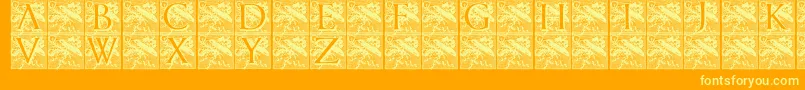 Pompadourinitials-fontti – keltaiset fontit oranssilla taustalla