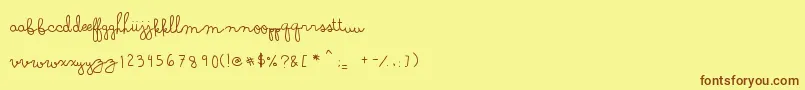 フォントDenneSoymilk – 茶色の文字が黄色の背景にあります。