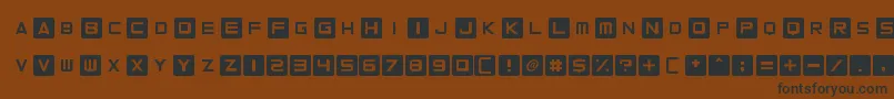 フォントCurvedSquare – 黒い文字が茶色の背景にあります