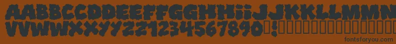 Shoplifters Font – Black Fonts on Brown Background