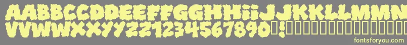 Shoplifters Font – Yellow Fonts on Gray Background