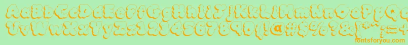 Mcklsh Font – Orange Fonts on Green Background