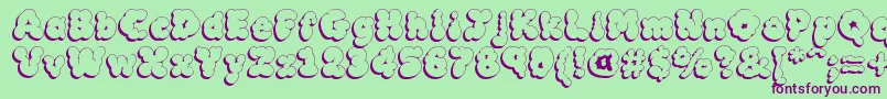 Mcklsh Font – Purple Fonts on Green Background