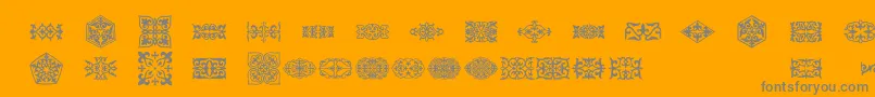 Prt Ornament3-Schriftart – Graue Schriften auf orangefarbenem Hintergrund