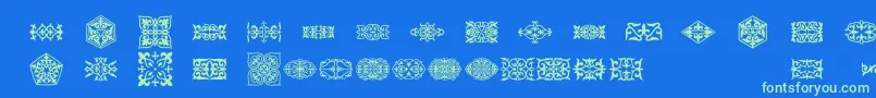 Prt Ornament3-Schriftart – Grüne Schriften auf blauem Hintergrund