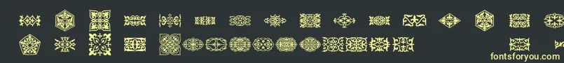 Prt Ornament3 Font – Yellow Fonts on Black Background