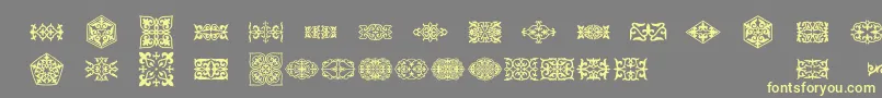 Prt Ornament3 Font – Yellow Fonts on Gray Background