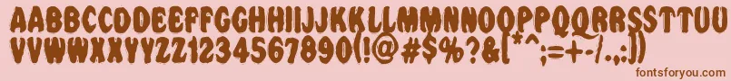Vtcnightofthedrippybentcaps Font – Brown Fonts on Pink Background