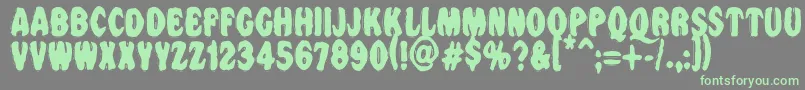 Vtcnightofthedrippybentcaps Font – Green Fonts on Gray Background