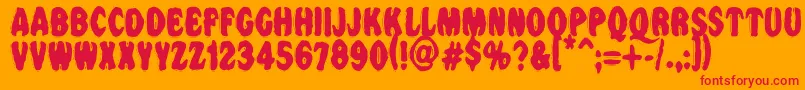 Vtcnightofthedrippybentcaps Font – Red Fonts on Orange Background