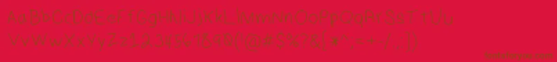 フォントHmKeokuk – 赤い背景に茶色の文字