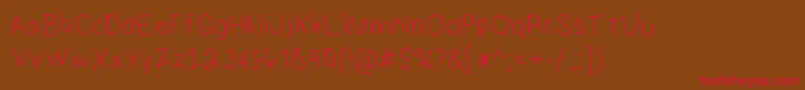 HmKeokuk Font – Red Fonts on Brown Background