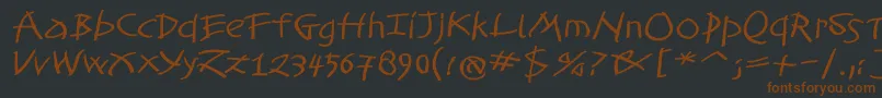 TomahawkedBold Font – Brown Fonts on Black Background