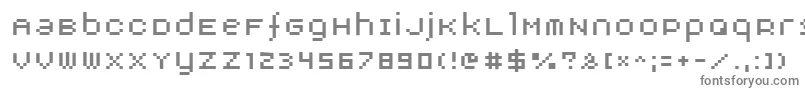 フォントAuxDotbitc – 白い背景に灰色の文字