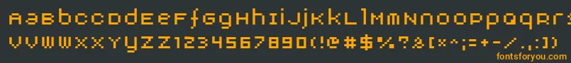 フォントAuxDotbitc – 黒い背景にオレンジの文字