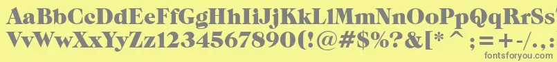 フォントGrouchBt – 黄色の背景に灰色の文字