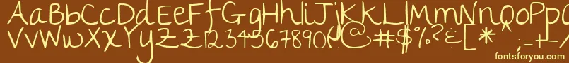 Thegirlnextdoor Font – Yellow Fonts on Brown Background