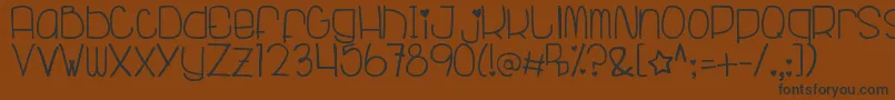 TubagusRanggaEfarasti Font – Black Fonts on Brown Background