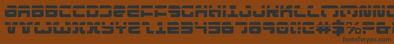 ExedoreLaser Font – Black Fonts on Brown Background