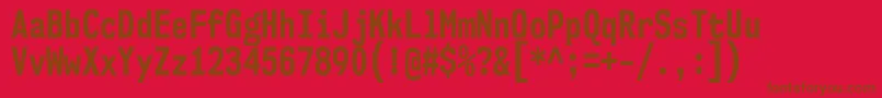 Nk57MonospaceCdBd-fontti – ruskeat fontit punaisella taustalla