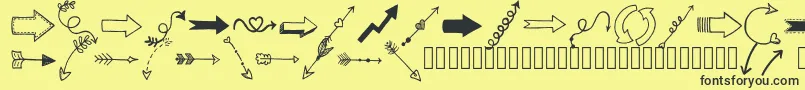 Czcionka Tanaesteldoodlearrows01Regular – czarne czcionki na żółtym tle