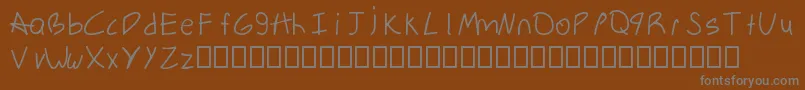 Шрифт HandwrittenSerialKillerMac – серые шрифты на коричневом фоне