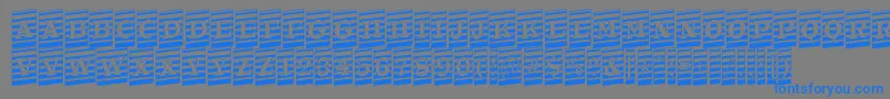 ATrianglercmmrup-Schriftart – Blaue Schriften auf grauem Hintergrund