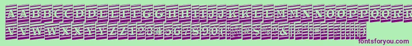 フォントATrianglercmmrup – 緑の背景に紫のフォント