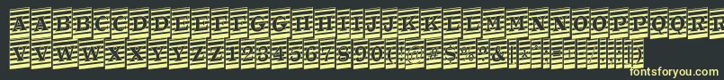 ATrianglercmmrup-Schriftart – Gelbe Schriften auf schwarzem Hintergrund