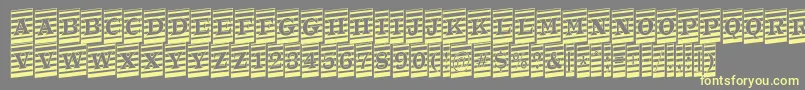 ATrianglercmmrup Font – Yellow Fonts on Gray Background